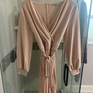 Beautiful holiday dress with sequins on the skirt. One piece.